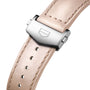 Close-up of a beige leather strap with a silver clasp, engraved with the TAG Heuer logo, designed for the Carrera Chronograph.