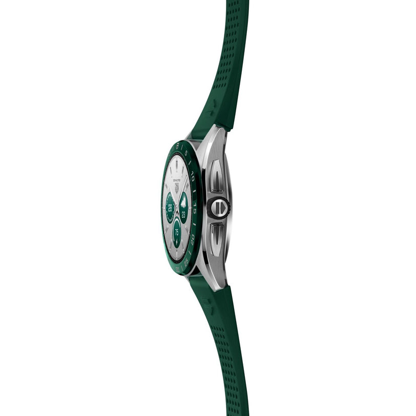 Side view of the TAG Heuer Connected Calibre E4 wristwatch, featuring a green strap and bezel, set against a white background.