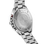 The image shows the back of a TAG Heuer Special Edition Formula 1 X Indy 500 stainless steel watch, featuring engraved branding, specifications like Special Edition and Indy 500, metal bracelet, buttons, and 200 meters water resistance.