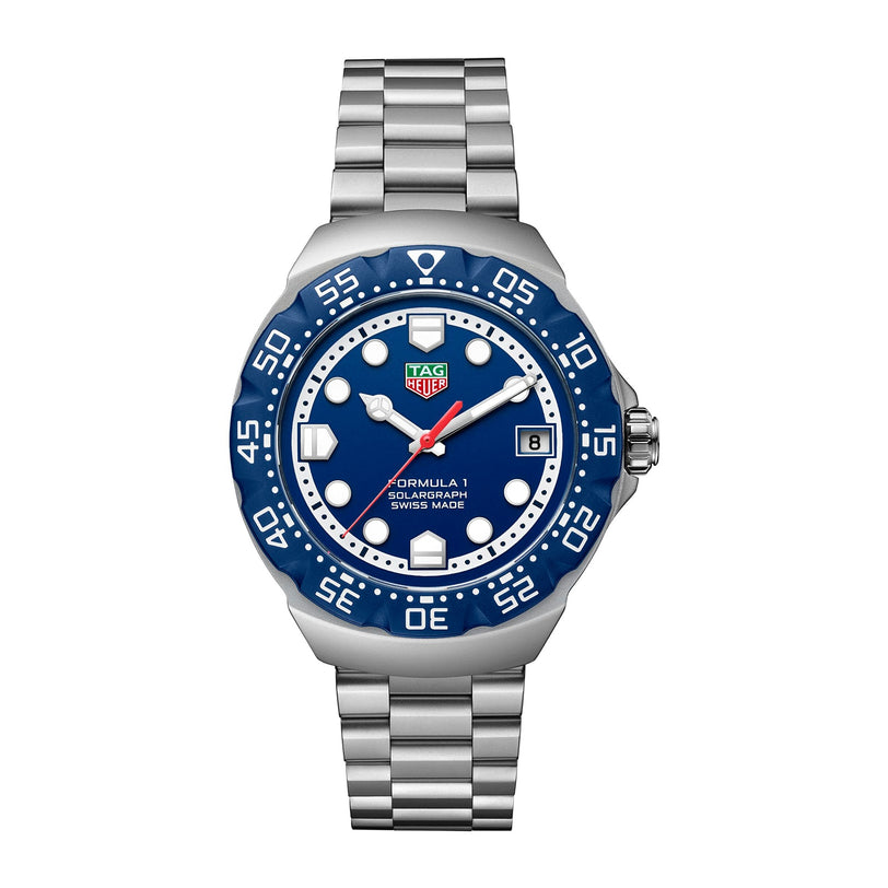 A TAG Heuer Formula 1 Solargraph watch with a blue bezel, blue dial, and silver metal bracelet.