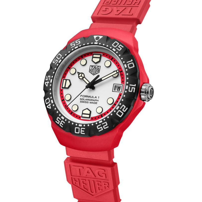 Red TAG Heuer Formula 1 Solargraph watch featuring a white dial, black bezel, and bold hour markers.