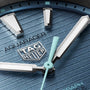 Close-up of a blue TAG Heuer Aquaracer Professional 200 Solargraph watch face, highlighting the hands, markers, and logo.