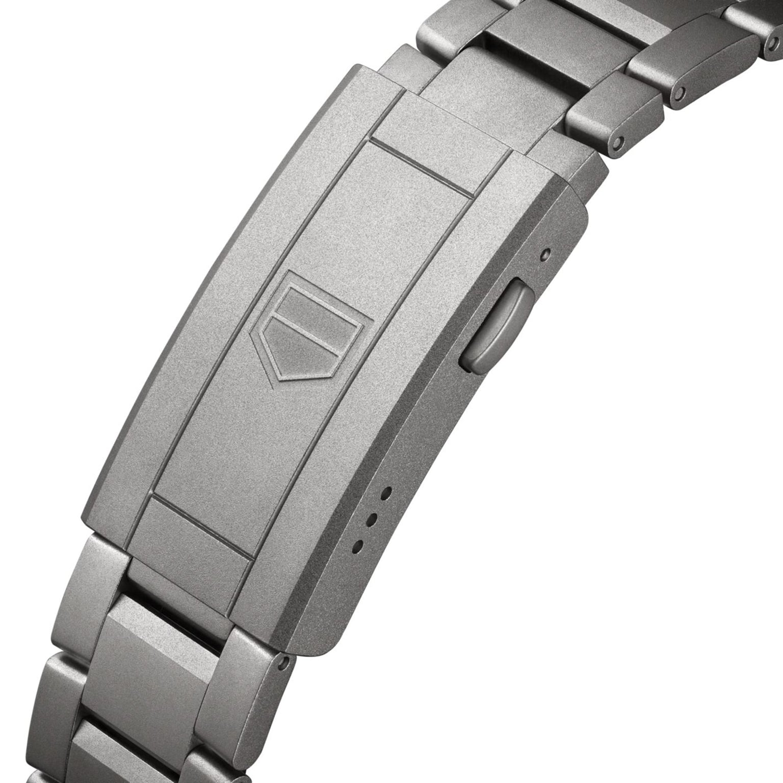 Close-up of the TAG Heuer Aquaracer Professional 200 Solargraph’s stainless steel clasp, engraved with the shield logo.