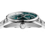 Side view of the TAG Heuer Carrera Date Twin-Time, a stainless steel wristwatch with a green face and silver bezel, highlighting the crown and lugs.