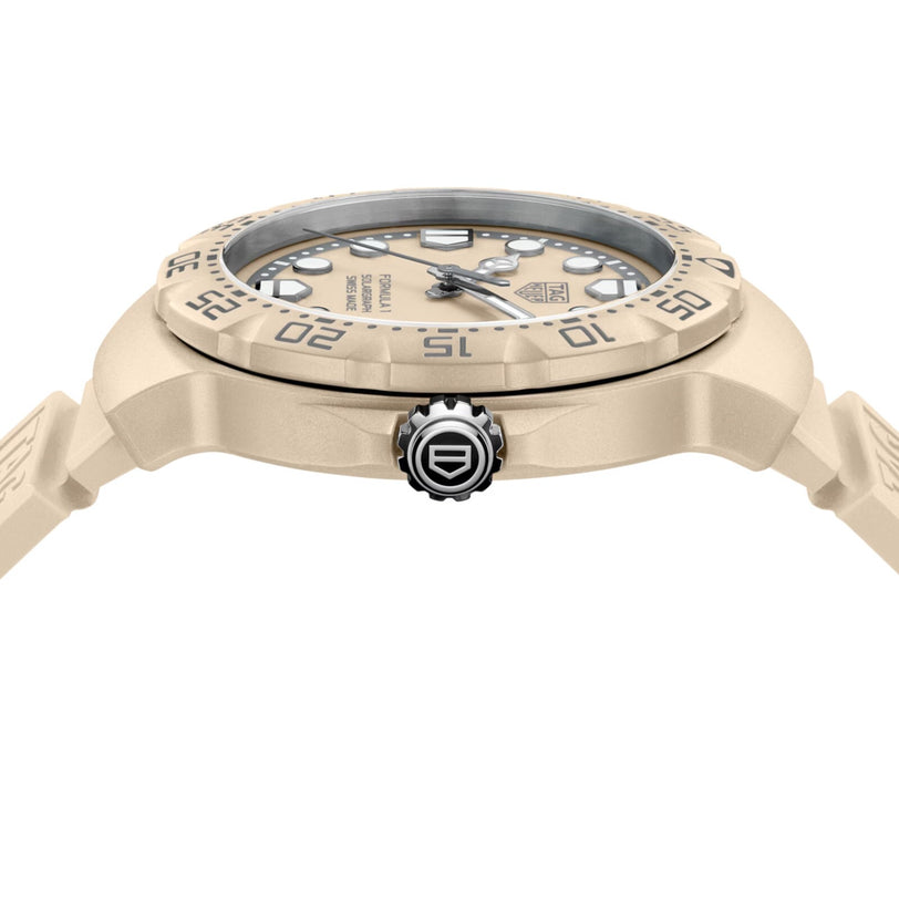 Beige watch with detailed face on a white background