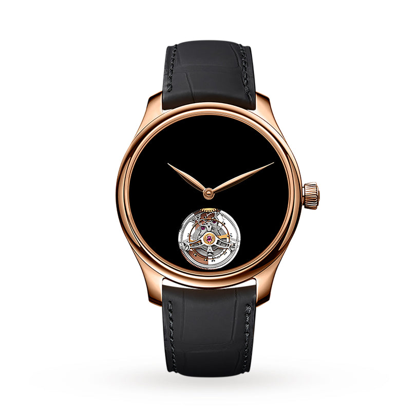 The H. Moser & Cie Endeavour Tourbillon Concept Vantablack® features a gold case, black dial, black leather strap, and a tourbillon visible at 6 o’clock.