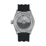 The image shows the back of a Blancpain Fifty Fathoms Bathyscaphe Quantième Complet Phases de Lune, featuring a visible automatic movement, black strap, and engraved labels like “30 BAR,” “ANTIMAGNETIC,” and “SWISS MADE.”.