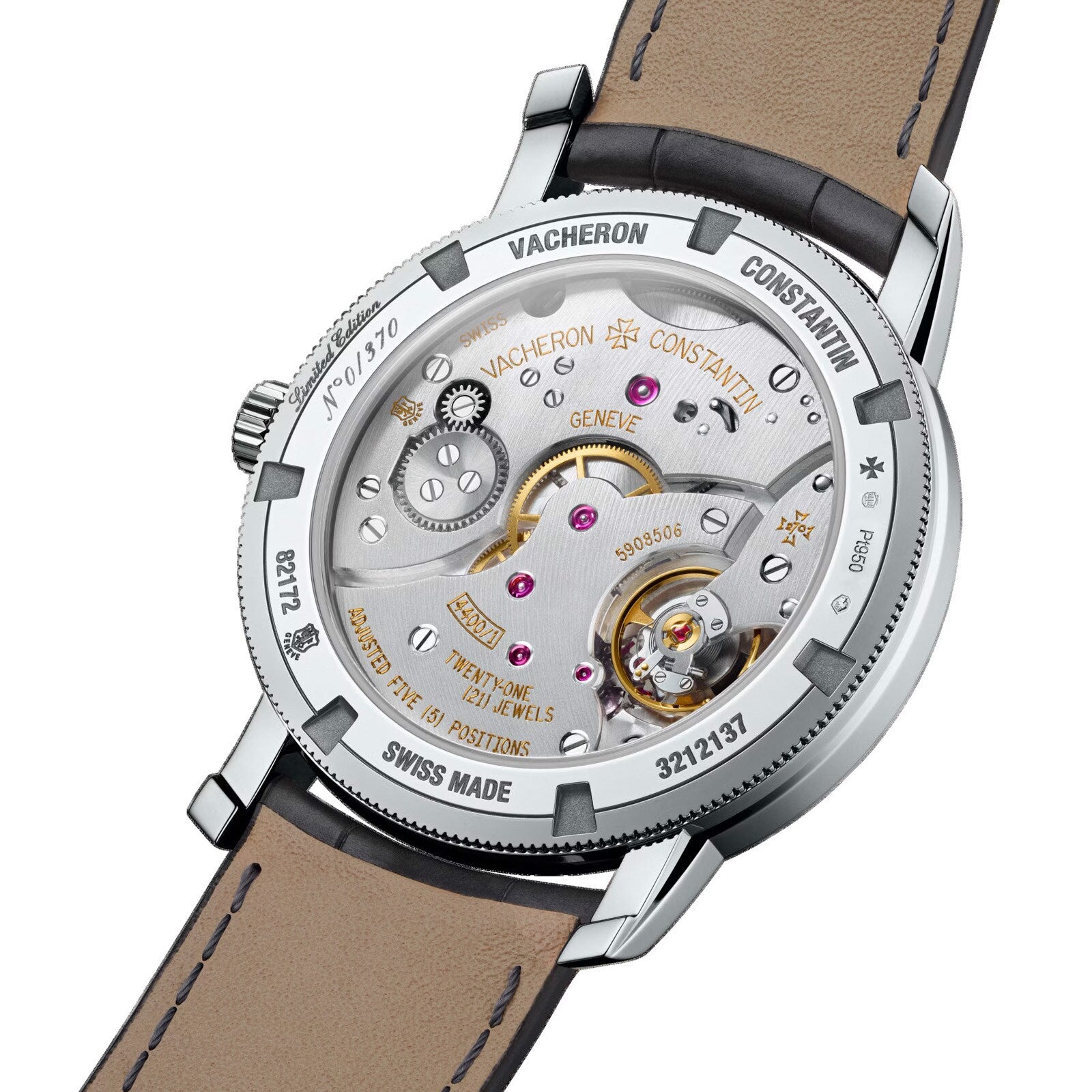 The image displays the back of the Vacheron Constantin Traditionnelle Manual-Winding watch, highlighting its mechanical movement, engraved details, and a leather strap.