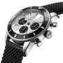 The Breitling Superocean Heritage B01 Chronograph 44 is a silver wristwatch with a black bezel, three subdials, and a textured black rubber strap. The dial displays the Breitling logo and the watch is water resistant for everyday wear.