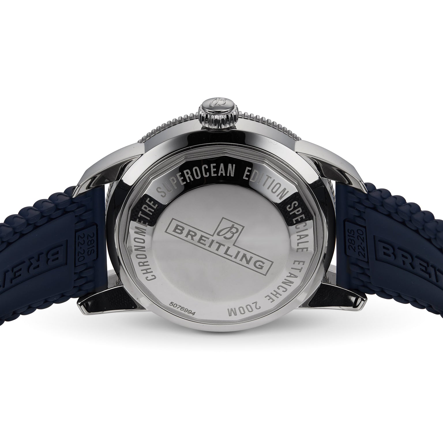 The back of the Breitling Superocean Heritage B20 Automatic 44 is shown, featuring engraved text highlighting its 200M water resistance and celebrated diver’s watch heritage, paired with a blue braided strap.