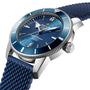 Close-up of a Breitling Superocean Heritage B20 Automatic 46 wristwatch featuring a blue dial, silver hour markers, luminescent hands, a blue textured strap, water resistance, and a date window at 6 o’clock.