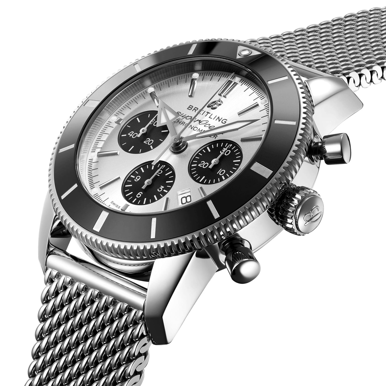 A close-up of the Breitling Superocean Heritage B01 Chronograph 44 with a silver mesh band, black bezel, and three subdials on a silver face, highlighting its water-resistant design.