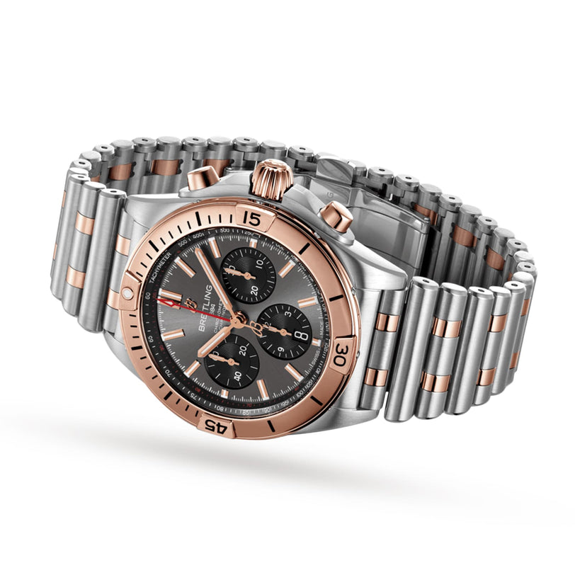 The Breitling Chronomat B01 42 is a two-tone stainless steel and rose gold wristwatch with a black dial, three subdials, linked metal bracelet, and powered by the acclaimed Breitling 01 mechanical movement.