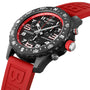 Close-up of the Breitling Endurance Pro 44, an athleisure watch featuring a black dial with red accents, a red rubber strap, Breitlight® case, white numerals on the bezel, and a pulsometer scale on its SuperQuartz™ chronograph.