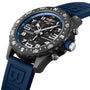 Close-up of the Breitling Endurance Pro 44 athleisure watch, showcasing a Breitlight® case, black dial, blue rubber strap, and pulsometer scale on the bezel.
