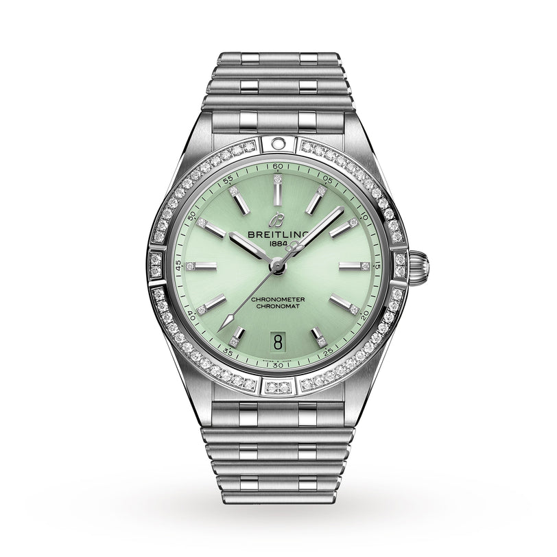 The Breitling Chronomat Automatic 36 is a silver wristwatch featuring a mint green face with diamond accents on the bezel and markers.