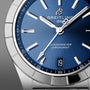 Close-up of the Breitling Chronomat 32 watch featuring a blue dial with silver hour markers and hands.