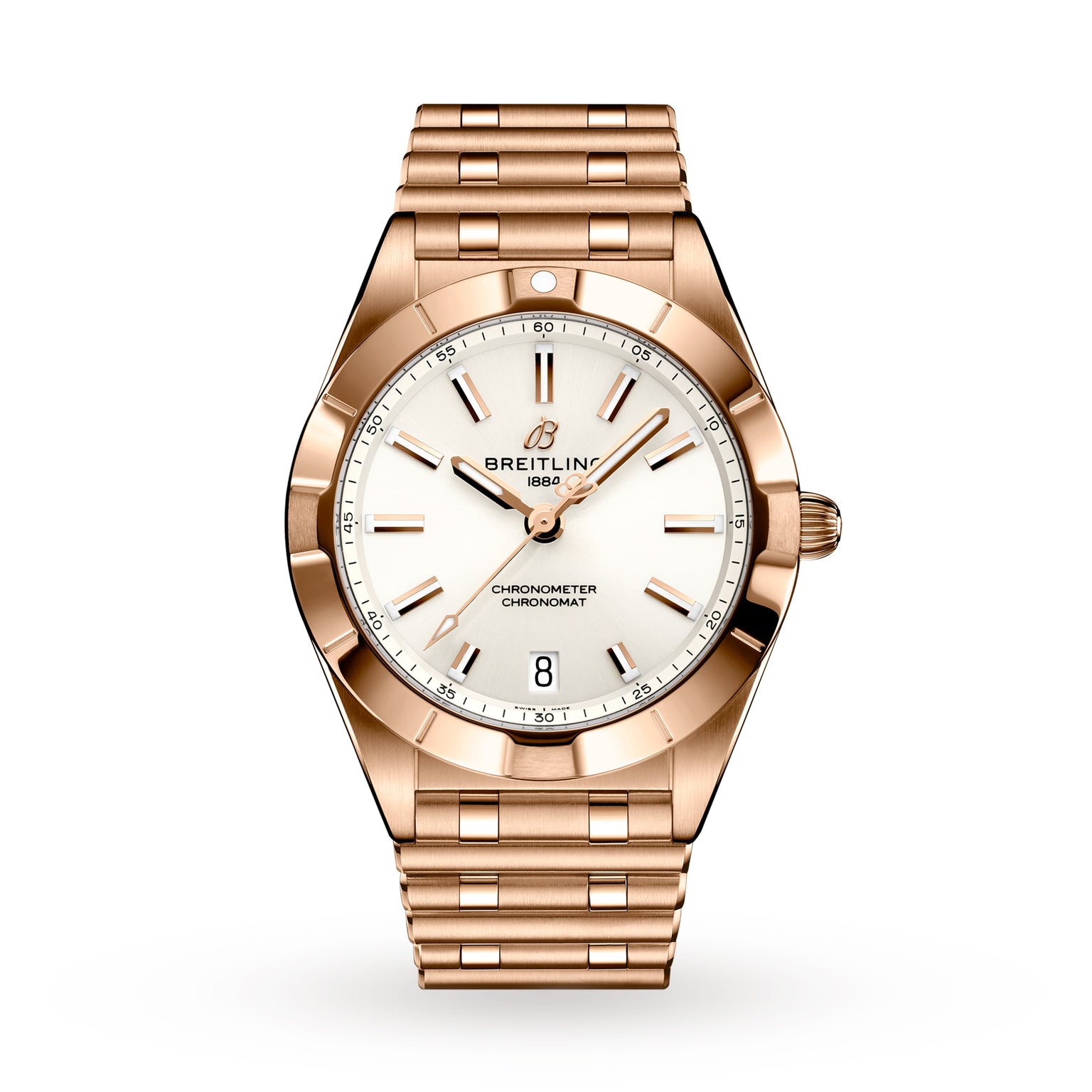 The Breitling Chronomat 32 is a stylish sports watch with a rose gold case, white dial and gold hour markers, date at 6 o’clock, and a matching metal bracelet.