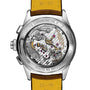 Back view of the Breitling Premier B15 Duograph 42, featuring a transparent case revealing its intricate COSC-certified movement, visible gears, and a brown leather strap with yellow lining.