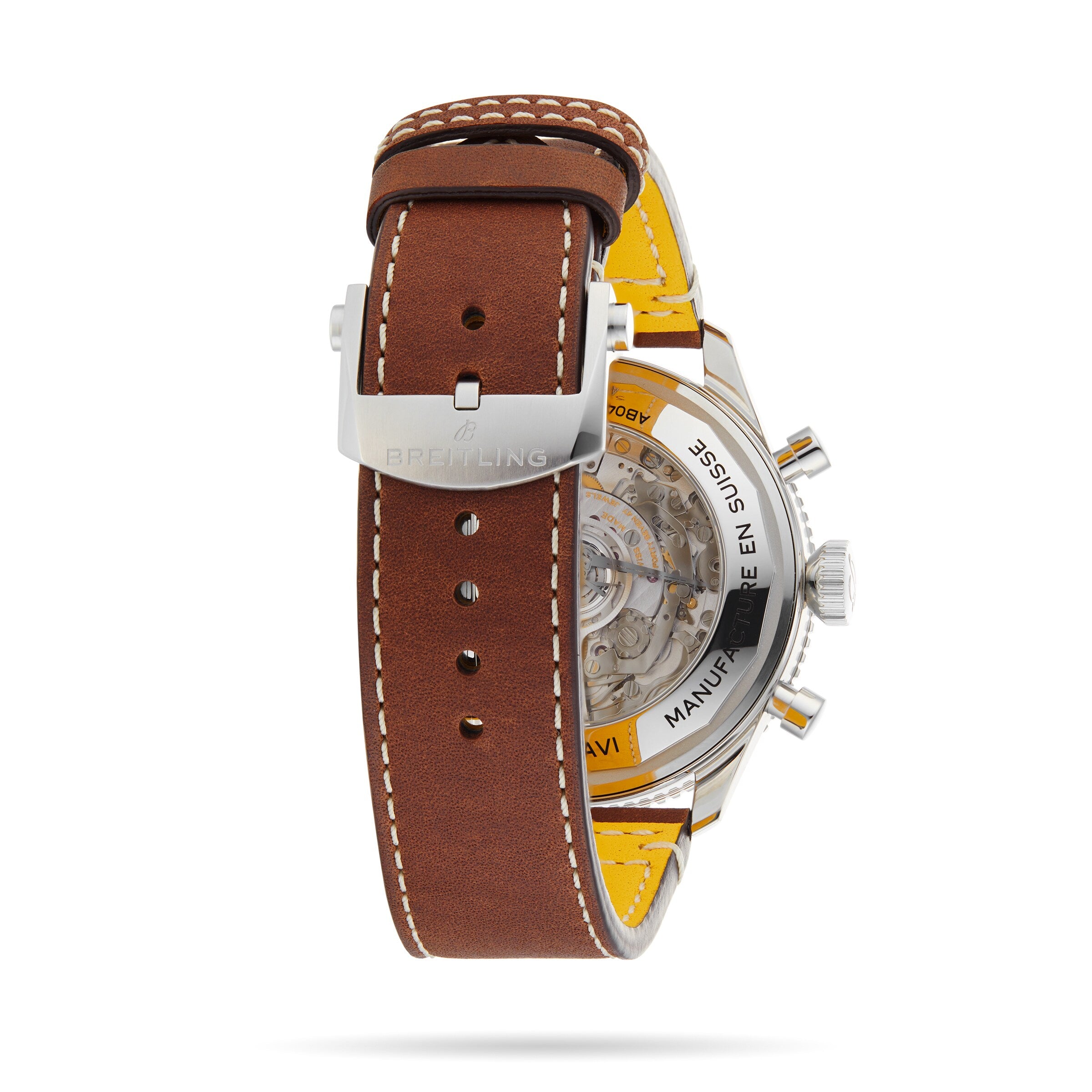 A close-up of the Breitling Super AVI B04 Chronograph GMT 46 Curtiss Warhawk showcases its back case, visible movement, and brown leather strap with a silver buckle—emphasizing its aviation heritage.