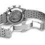 Close-up of the back of the Breitling Navitimer B01 Chronograph 43, showing the exposed Breitling 01 calibre movement, engraved details, and open clasp with the Breitling logo.