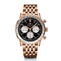 A Breitling Navitimer B01 Chronograph 43 wristwatch with a rose gold case, black dial, three silver subdials, and metal link bracelet is displayed on a white background.