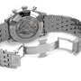 Close-up of the Breitling Navitimer B01 Chronograph 46, showcasing its engraved silver clasp and visible mechanical movement through the transparent case back.