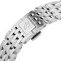 Close-up of a silver metal bracelet from the Breitling Navitimer B01 Chronograph 46, featuring a clasp engraved with the stylized B logo.