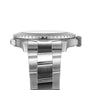 Side view of a Breitling Superocean Automatic 46, a 46mm stainless steel wristwatch with rotating bezel and metal bracelet, showing the crown and part of the band.