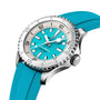The Breitling Superocean Automatic 36 is a silver diving watch with a turquoise dial, matching rubber strap, large white hour markers, and a ceramic-inlaid unidirectional bezel.