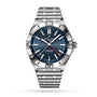 The Breitling Chronomat Automatic GMT 40 features a stainless steel case, blue dial with silver markers, GMT hand, date at 6 o’clock, and linked metal bracelet, powered by the Breitling 32 calibre—shown on a white background.