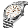 The Breitling Chronomat 32 is a stainless steel wristwatch with a mother of pearl dial, gold hour markers, and a date display at 6 o’clock, presented on a metal link bracelet.