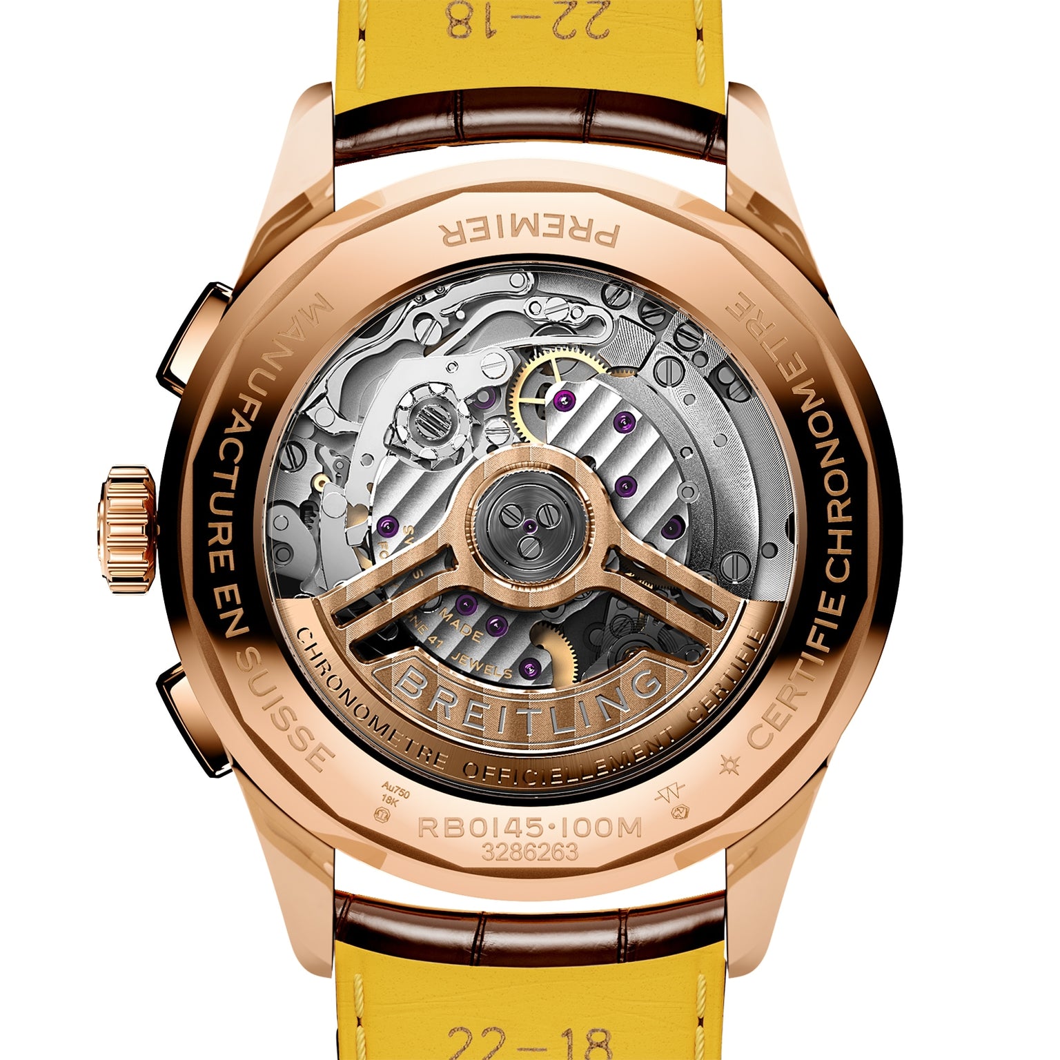 Close-up of the Breitling Premier B01 Chronograph 42’s back, featuring an 18K red gold case, visible COSC-certified movement, engraved details, and a yellow leather strap.