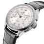 The Breitling Premier B09 Chronograph 42 features a stainless steel case, white dial with three subdials, and black leather strap. Shown at an angle on a white background.
