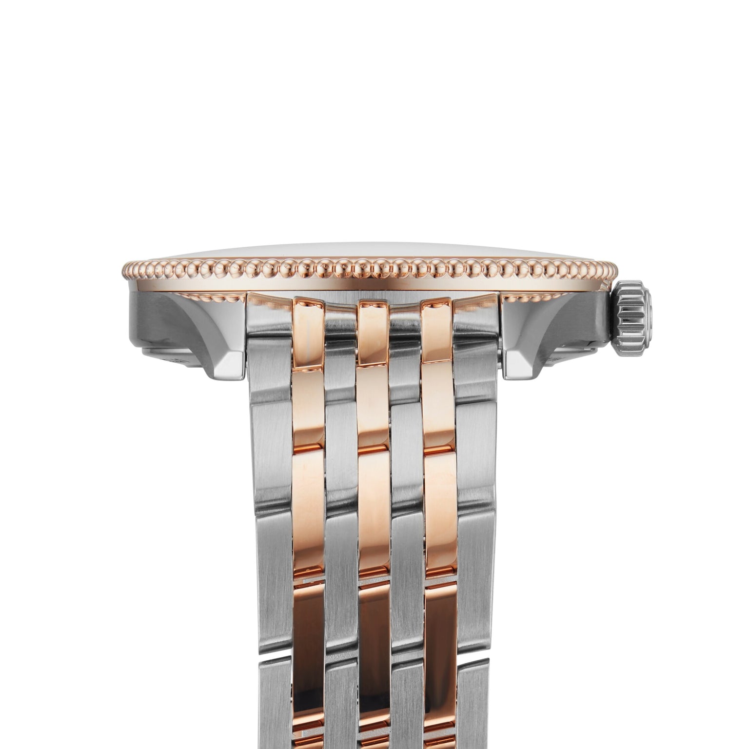 Close-up side view of the Breitling Navitimer 32, highlighting its two-tone metal bezel, crown, and interwoven silver and 18K red gold bracelet links.