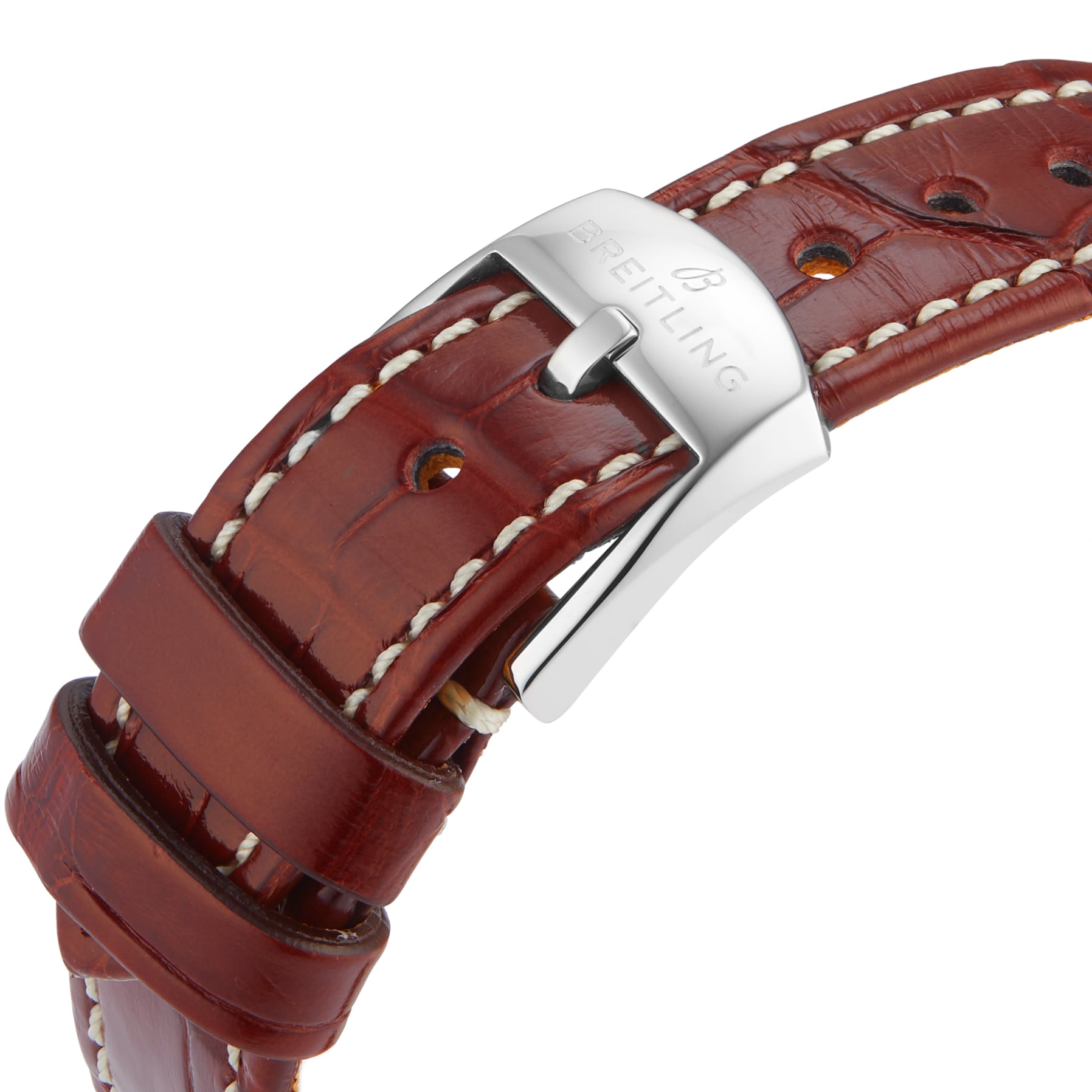 Close-up of a brown leather strap with white stitching and a stainless steel buckle engraved with the Breitling logo, complementing the Navitimer 32’s classic style.