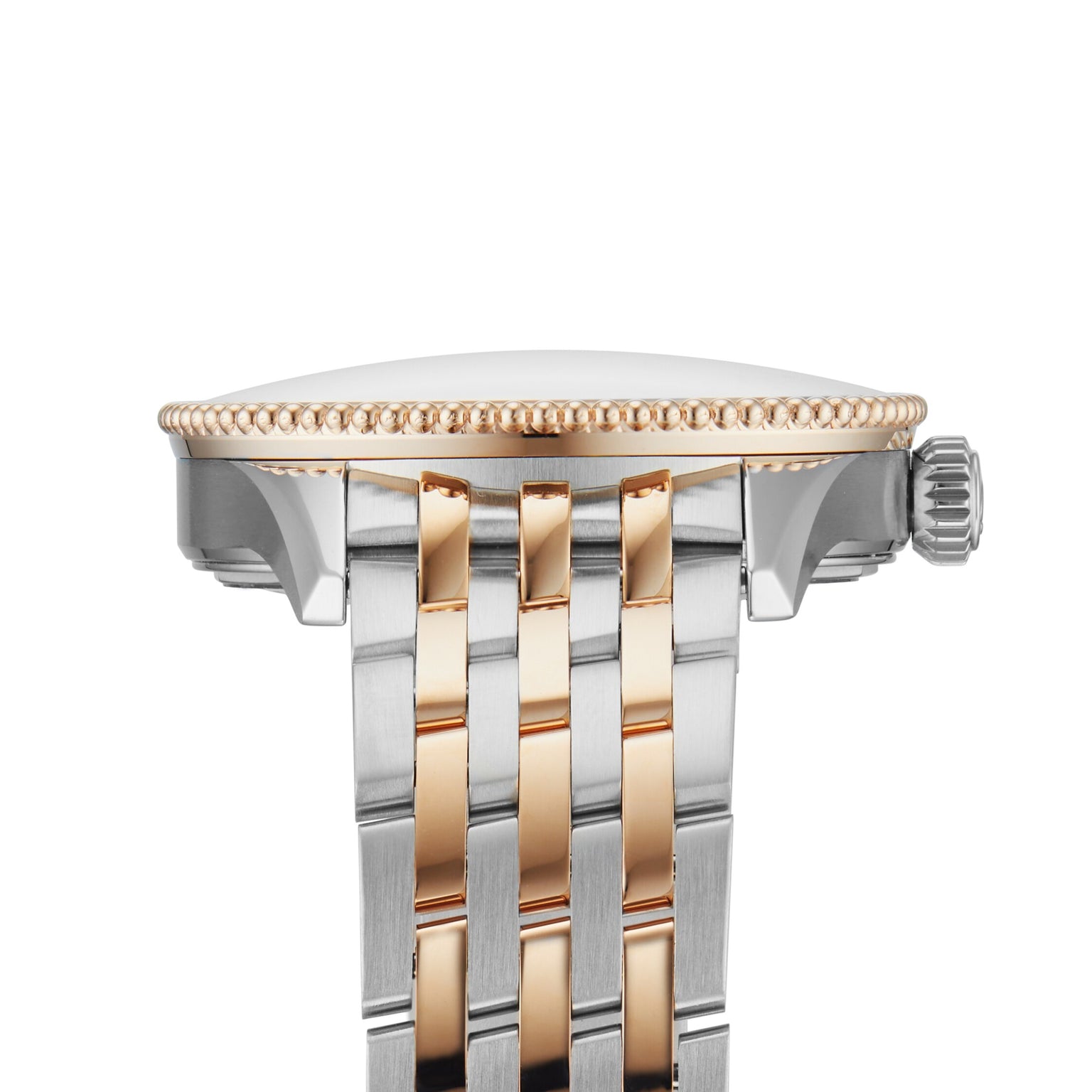 Close-up side view of the Breitling Navitimer Automatic 36, featuring a silver and gold two-tone metal band, a ribbed bezel, and the crown on the right side.