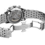 Close-up of the Breitling Navitimer B01 Chronograph 41’s stainless steel back reveals its open caseback, detailed chronograph movement, and engraved deployment clasp—a tribute to Breitling’s aviation legacy.