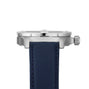 Side view of the Breitling Avenger Automatic 42, showcasing its 42mm stainless steel case, ridged crown, textured blue strap, and Breitling 17 calibre movement against a plain white background.