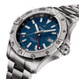 The Breitling Avenger Automatic GMT 44 features water-resistant stainless steel, a blue dial with silver hour markers, a date window, and a silver bezel, shown at an angle on its metal bracelet.