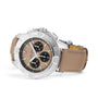 The Breitling Avenger B01 Chronograph 44 features a stainless steel case, beige dial with three black subdials, and a tan leather strap for a bold military-inspired style.