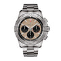 The Breitling Avenger B01 Chronograph 44 features a silver metal band, beige and black chronograph dial with three subdials, rotating bezel, and Breitling 01 calibre movement, shown on a white background.