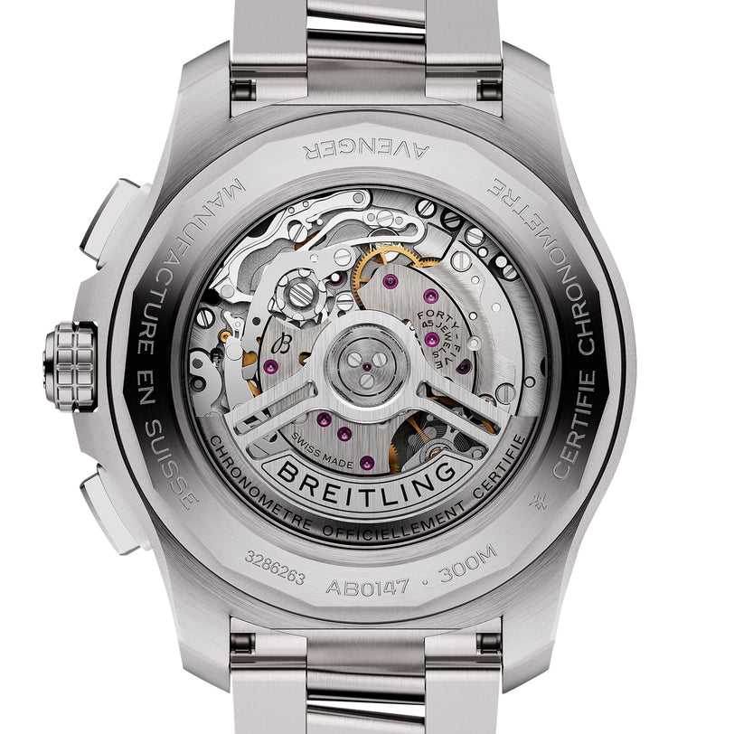 Close-up of the back of the Breitling Avenger B01 Chronograph 44, showing its exposed automatic movement and engraved aviation design details on the stainless steel case.