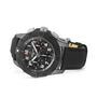 The Breitling Avenger B01 Chronograph 44 Night Mission features a black dial, bold bezel, and three subdials on a fabric strap, shown at an angle against a white background.