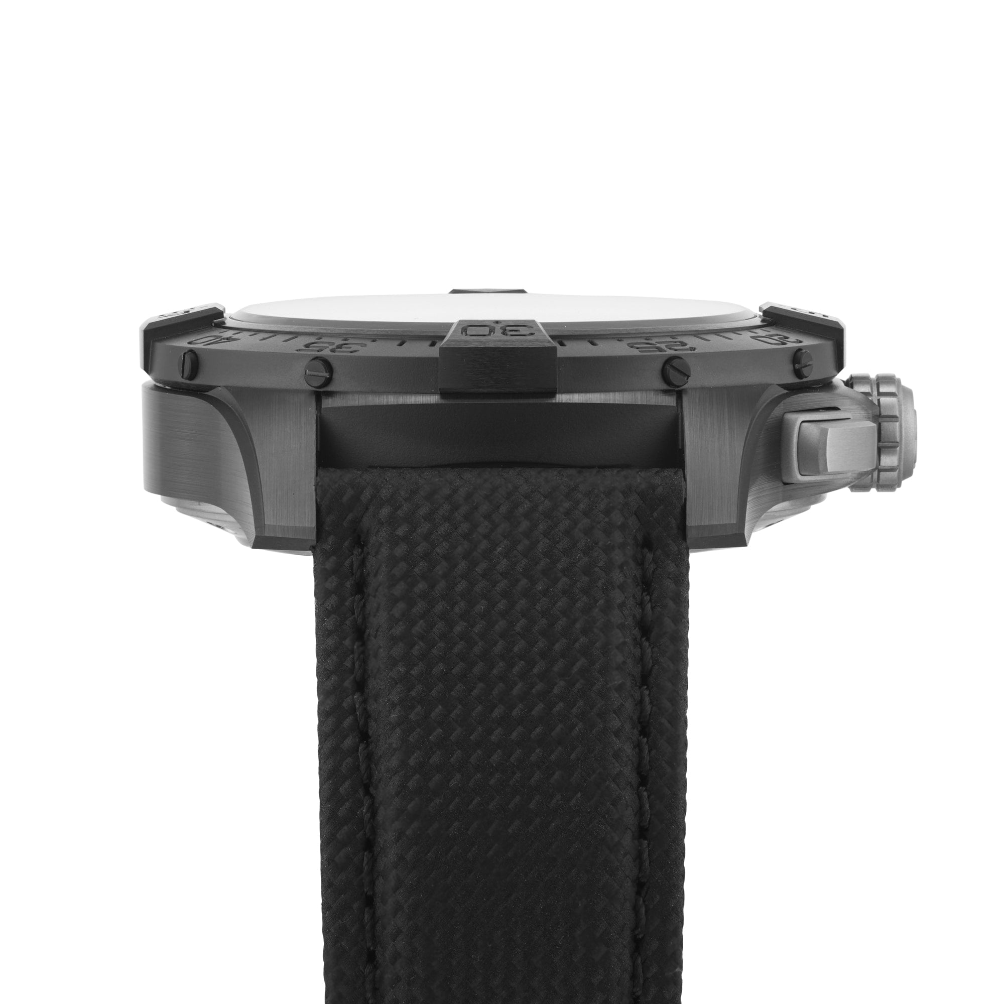 Side view of the Breitling Avenger B01 Chronograph 44 Night Mission, showing its black and silver angular case, textured black strap, black dial, prominent crown, and powered by the Breitling 01 calibre movement.