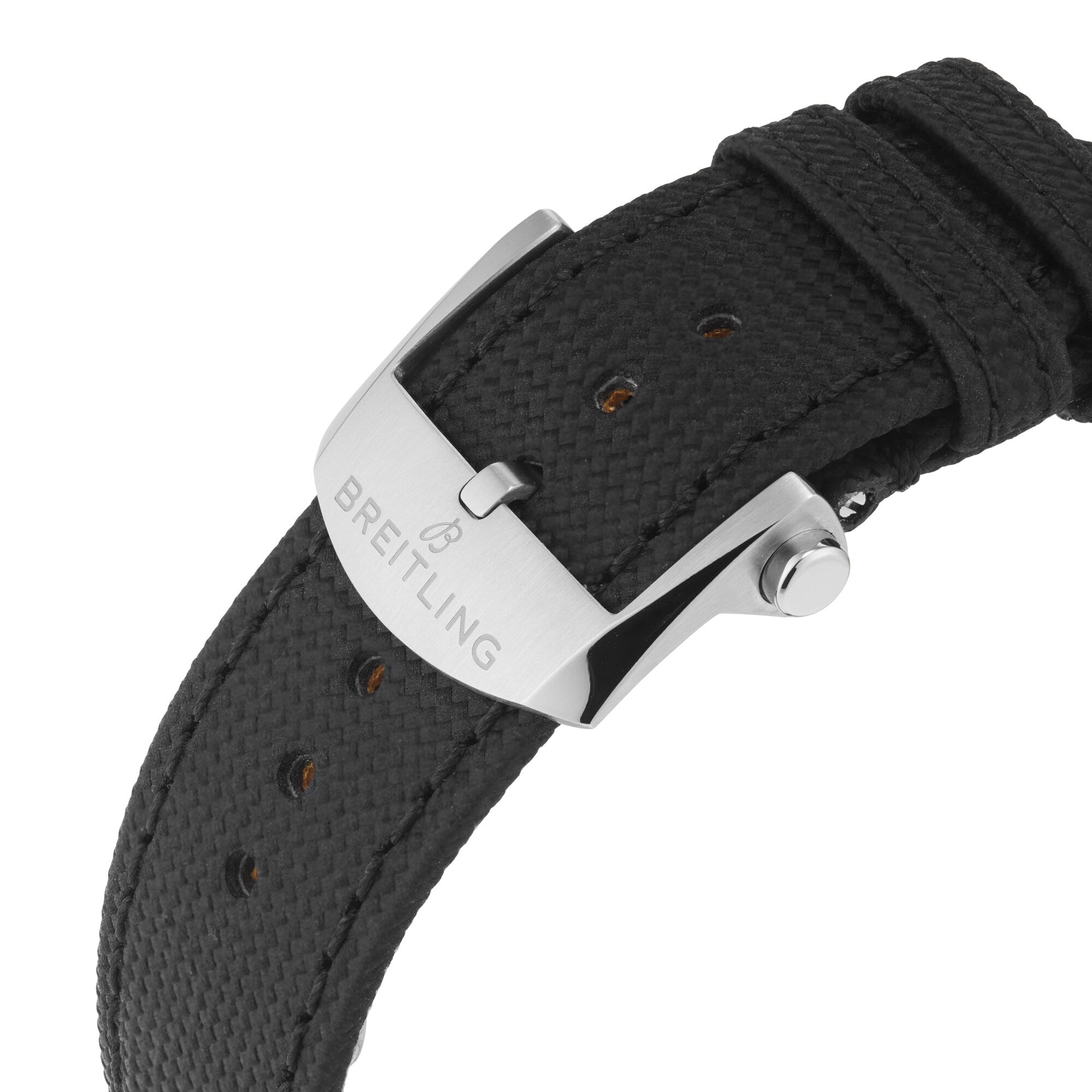 Close-up of a black textured strap with a silver buckle engraved with the Breitling logo, complementing the bold style of the Avenger B01 Chronograph 44 Night Mission and its striking black dial.