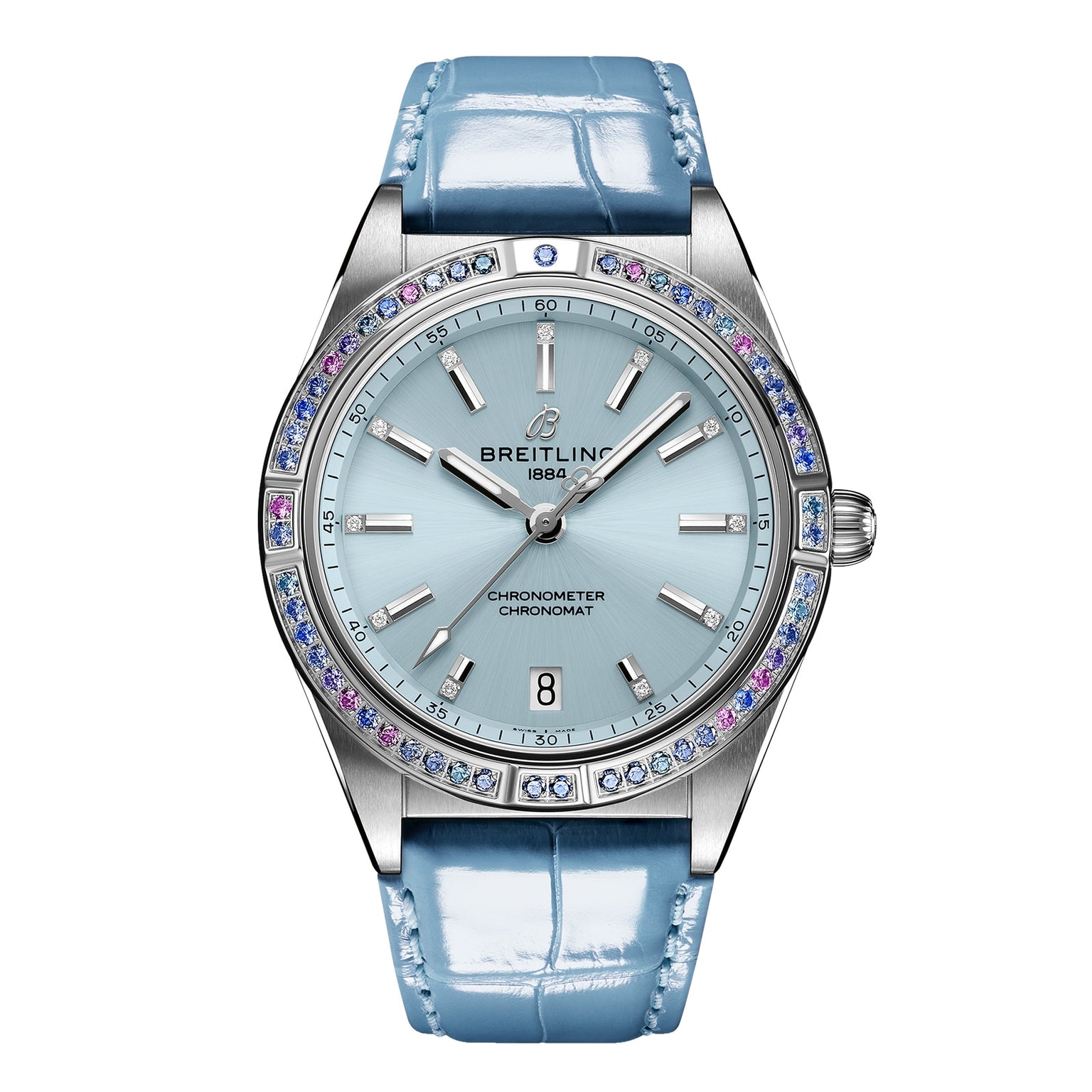 The Breitling Chronomat Automatic 36 South Sea features a light blue dial, 18K white gold gemstone bezel, silver markers, date at 6 o’clock, and a shiny light blue leather strap.