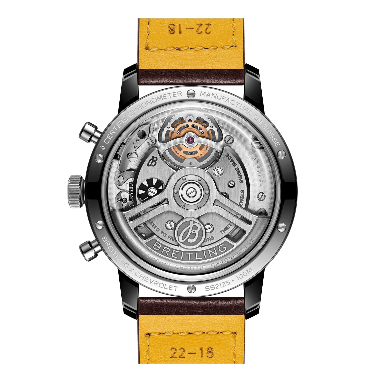 Back view of the Breitling Top Time B21 Chevrolet Corvette showing its exposed mechanical movement, labeled parts, and a yellow leather strap marked 22-18—capturing the classic sports car spirit.
