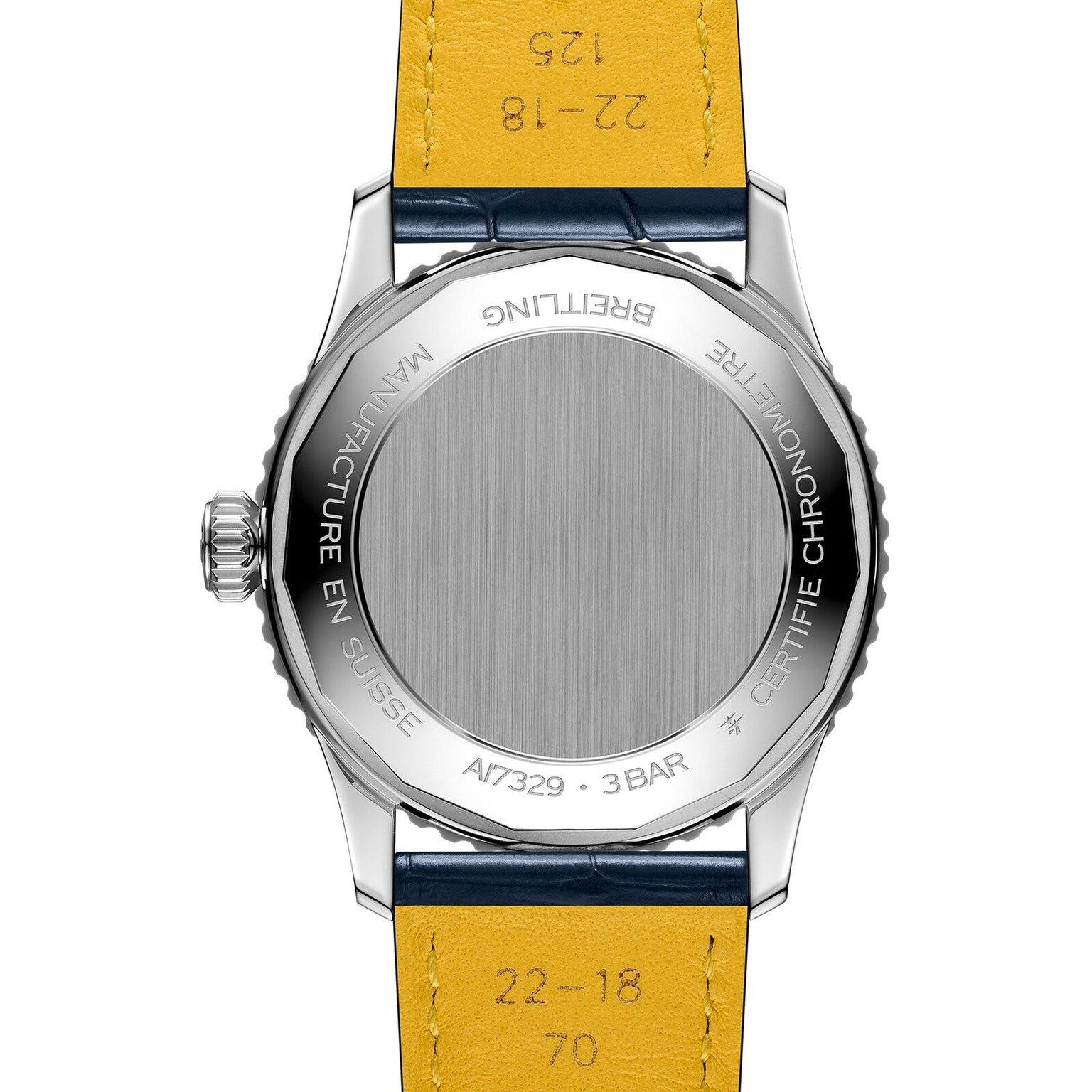 Back view of the Breitling Navitimer Automatic 41 showing its metal case back with engraved branding, certification details, model number, and a yellow leather strap, powered by the Breitling 17 calibre.