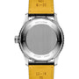 The back view of the Breitling Navitimer Automatic 41 showcases its engraved details and brushed metal case back, paired with a yellow leather strap.